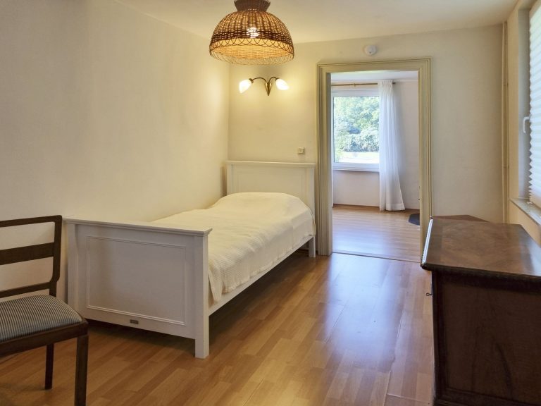 2. Schlafzimmer mit zwei gemütlichen Einzelbetten.